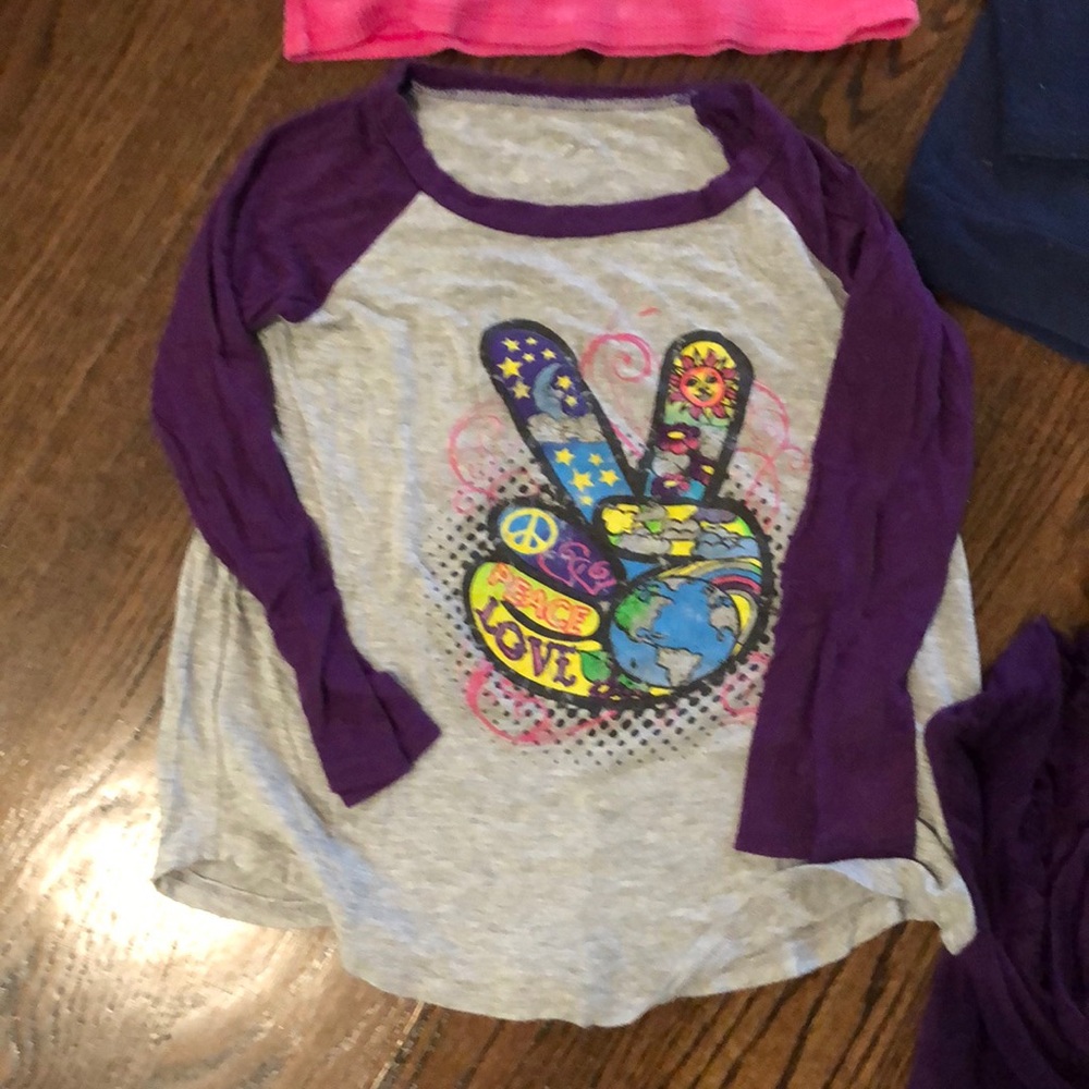 Assorted long sleeve shirts.